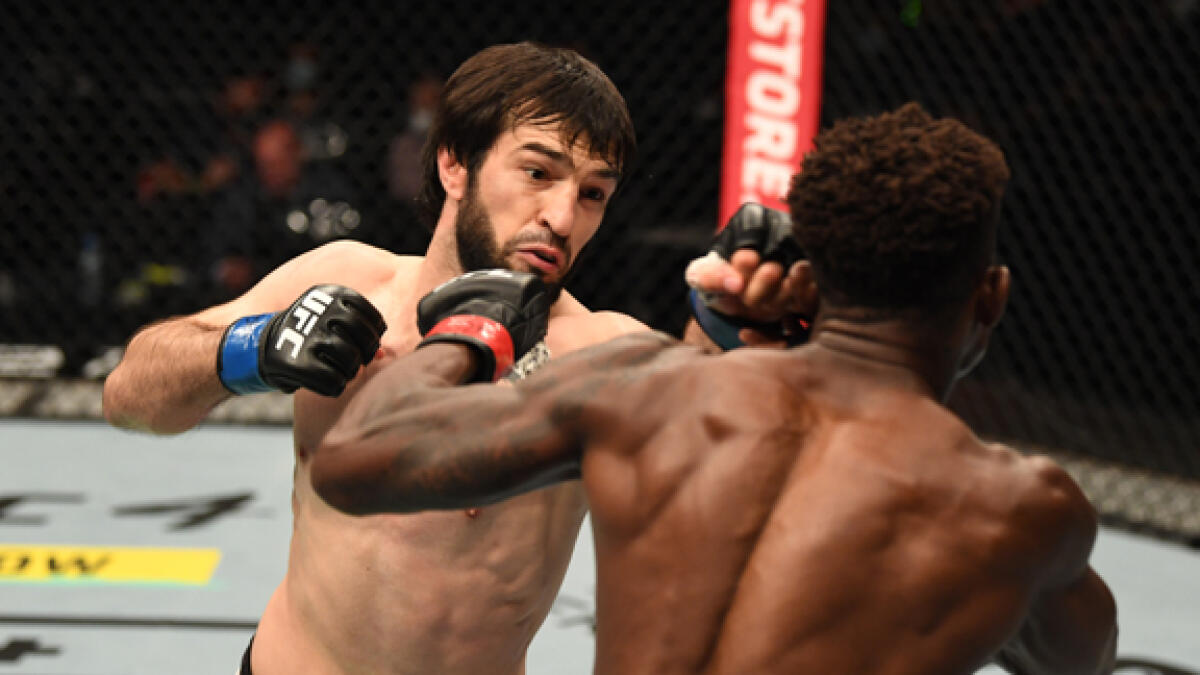 Zubaira Tukhugov punches Hakeem Dawodu during their featherweight bout at UFC Fight Island. - Supplied photo