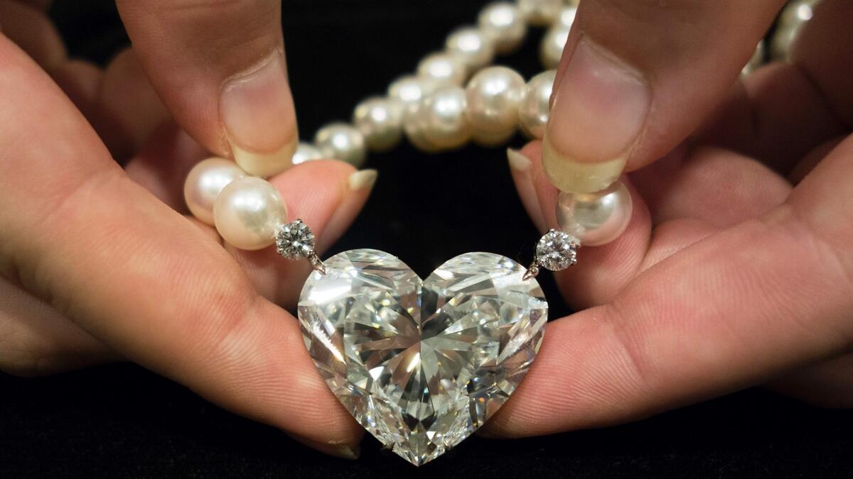 This file photo shows the La Légende heart-shaped 92 carat diamond being displayed at Christies in New York. 