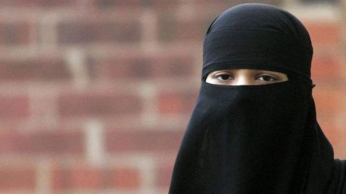 Muslim mother sues UK school over veil ban
