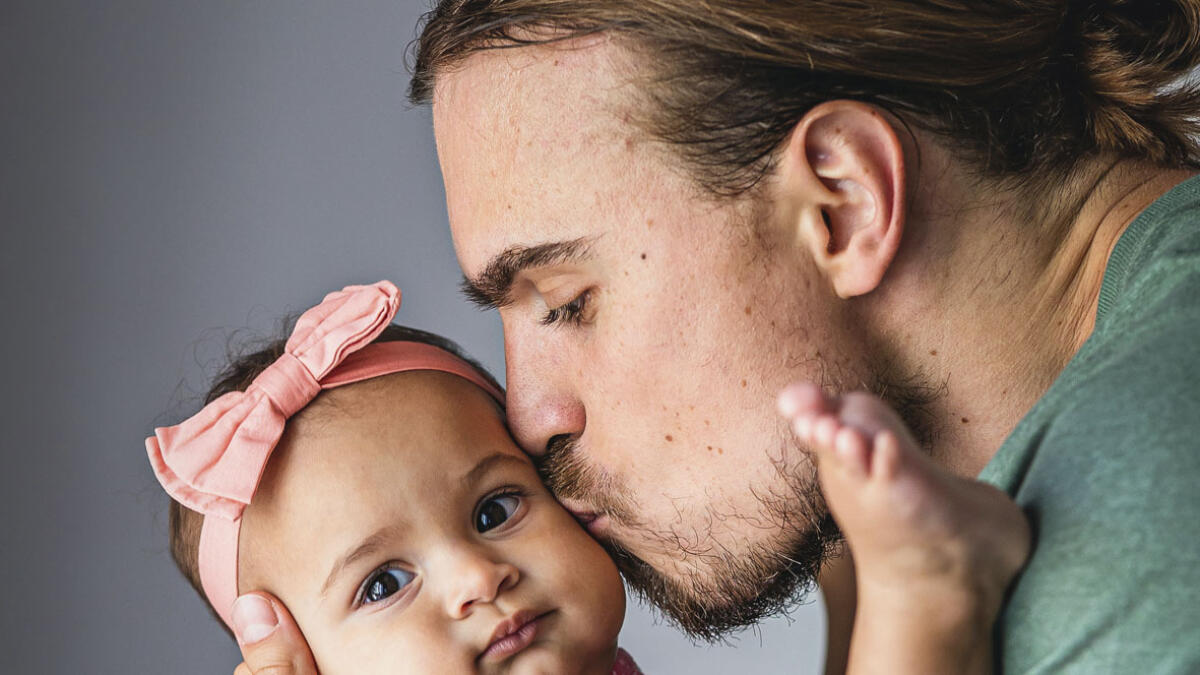 DOTING DAD: Milos Tanasic with his seven-month-old daughter Sofija