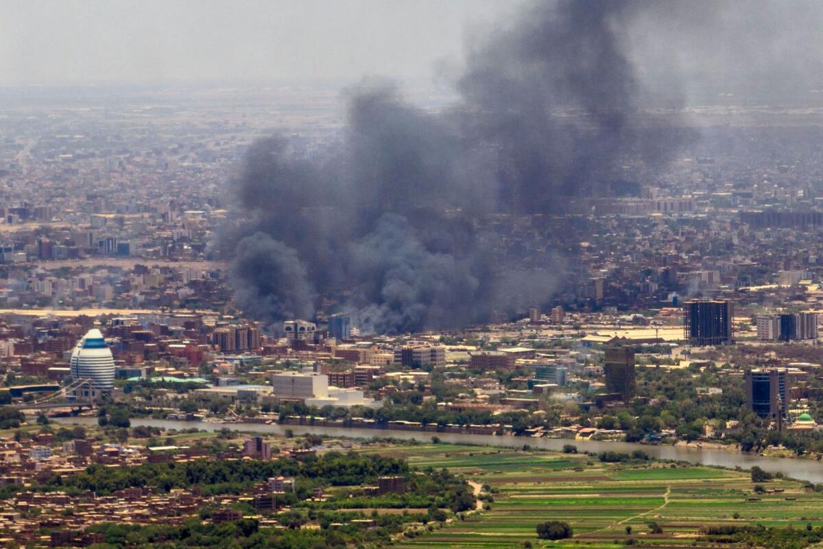 Smoke billows during fighting in the Sudanese capital Khartoum, on May 3. — AFP
