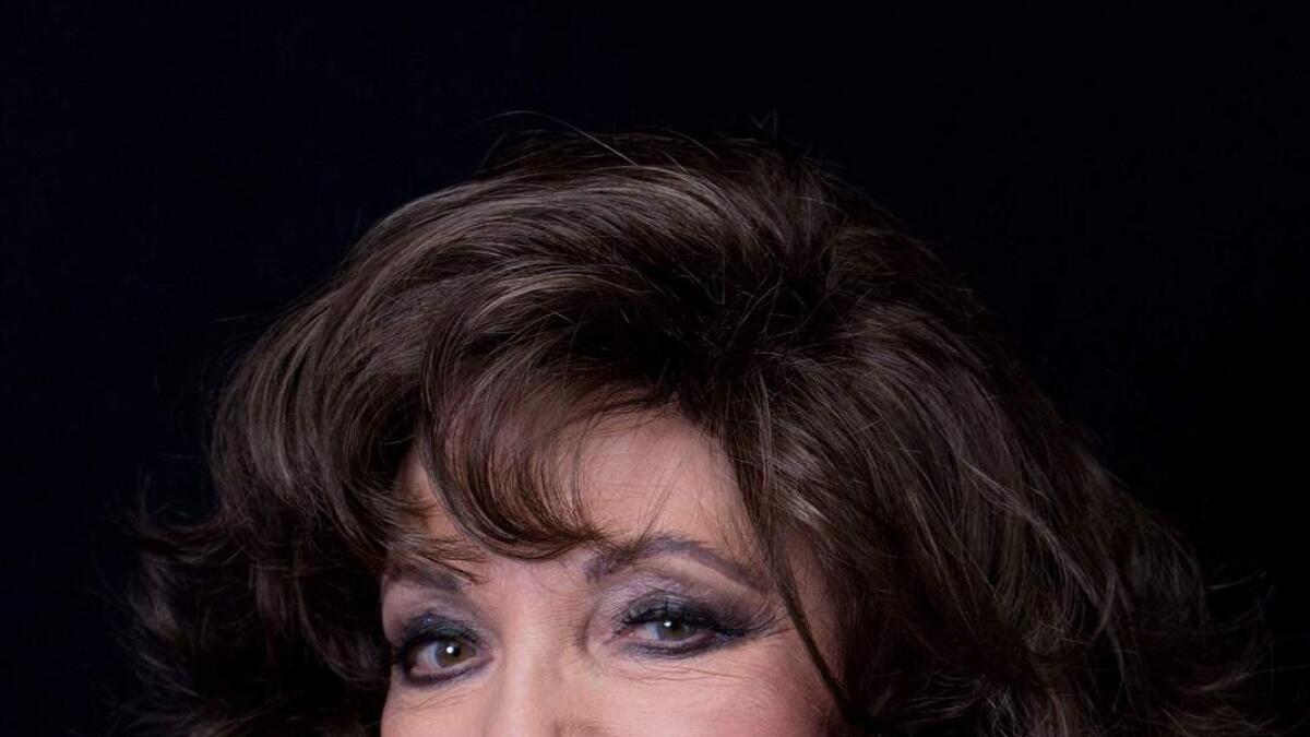 Joan Collins says Christmas bittersweet without Jackie