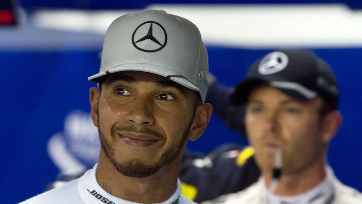 Motor racing-Anything possible in F1 title race, says Hamilton