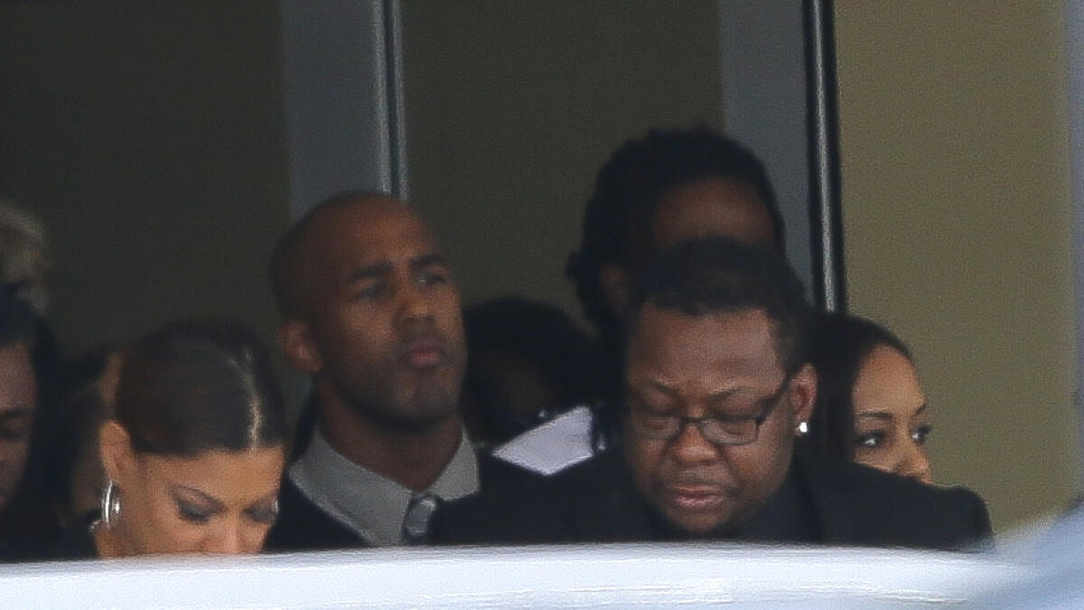 R&B singer Bobby Brown leaves a funeral service for his daughter Bobbi Kristina.  