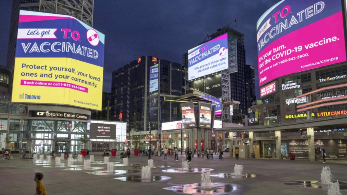Toronto's Yonge and Dundas Square, usually one of Canada's busiest places, is seen nearly empty during lockdown. — AFP