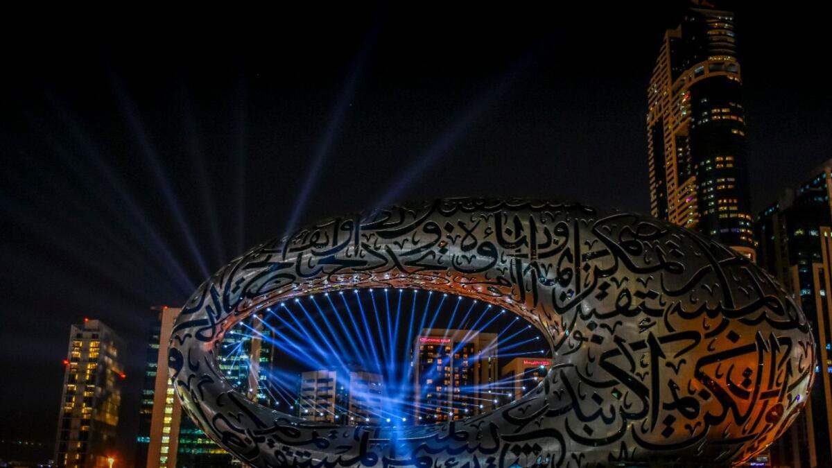 The iconic structure features a unique design with Arabic calligraphy inscribed onto the exterior.