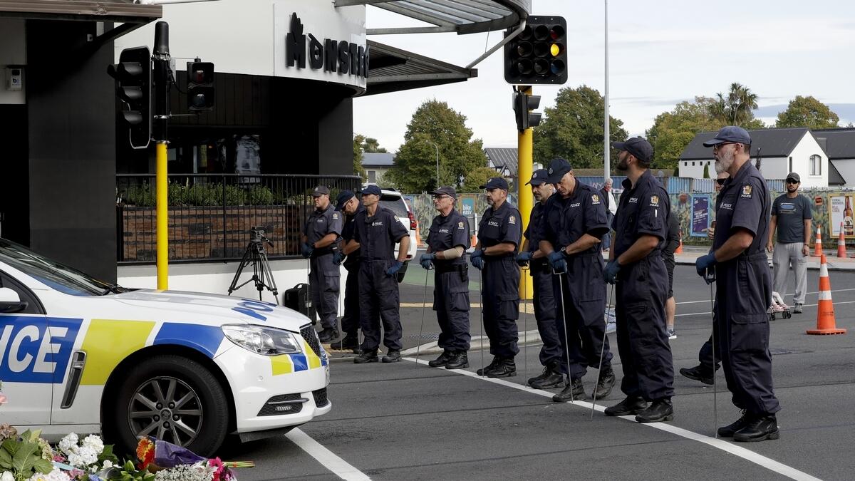Police officers prepare to search the area near the Masjid Al Noor mosque, site of one of the mass shootings at two mosques in Christchurch, New Zealand.-AP 