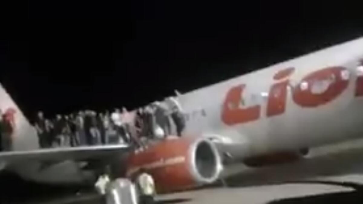 Video: 10 injured after man falsely claims bomb on plane