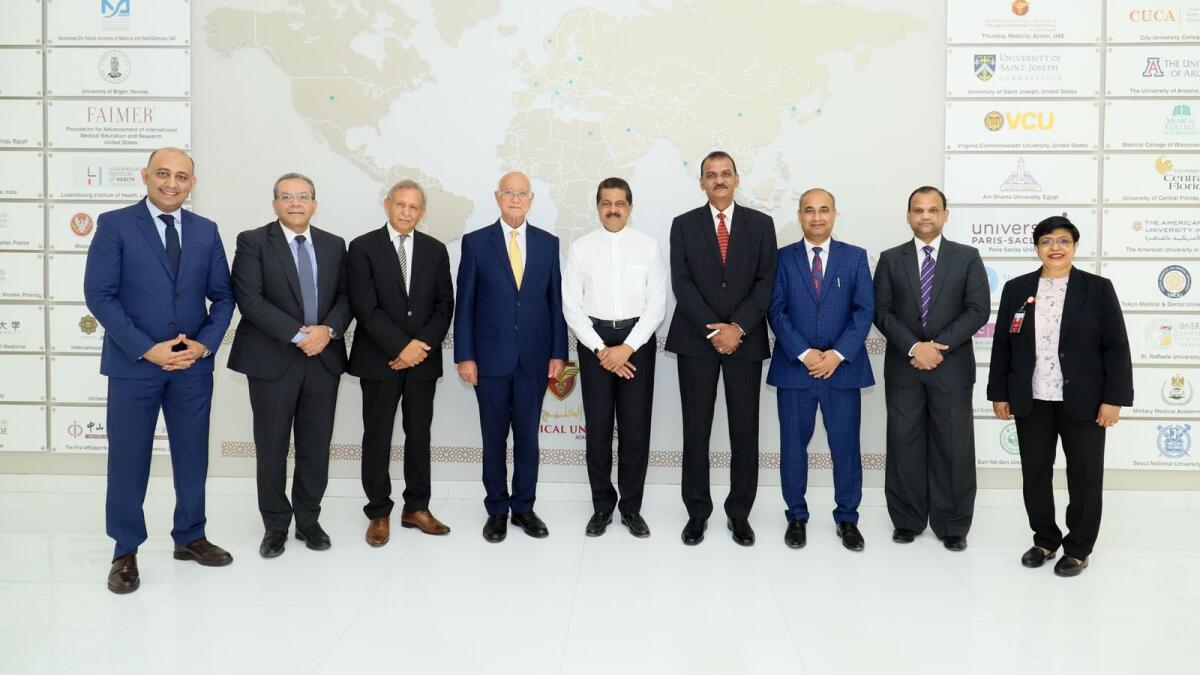 Dr Thumbay Moideen, founder president, board of trustees, along with the academic team of Gulf Medical University.