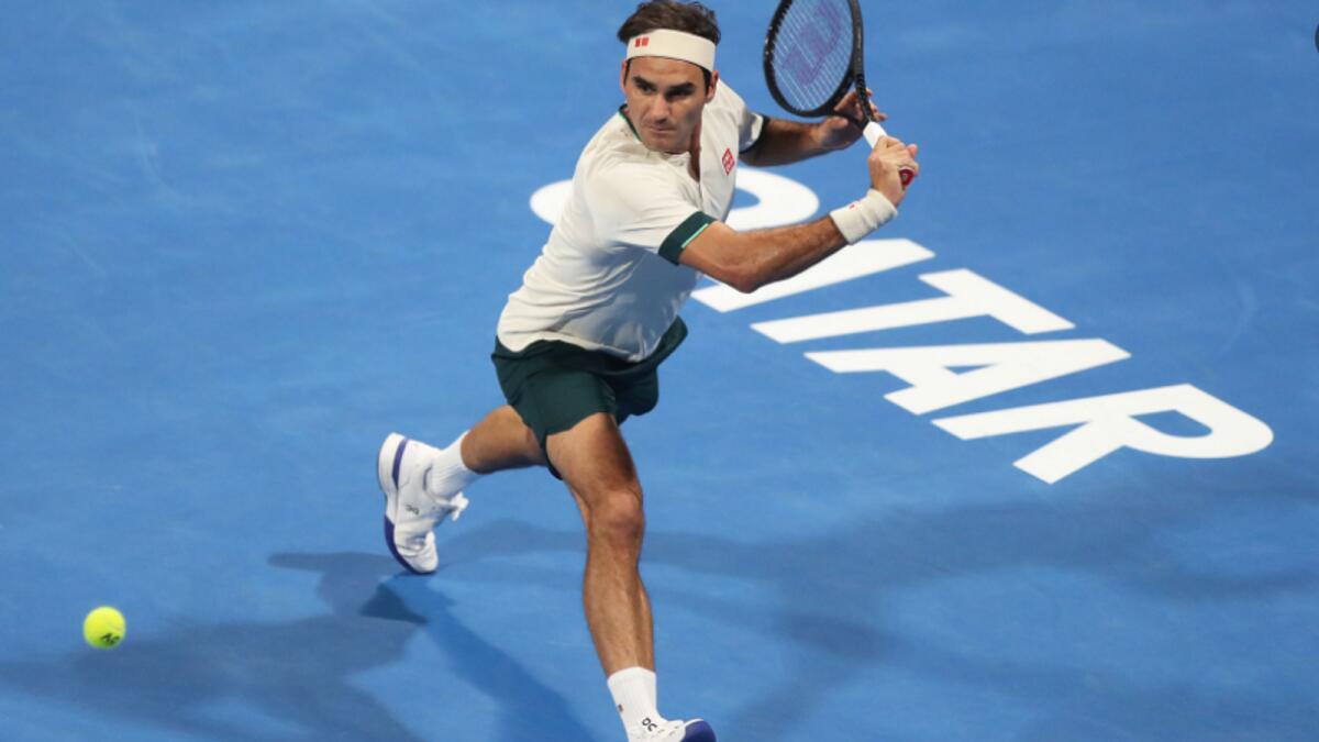 Roger Federer plays a backhand return during the match. (ATP Twitter)