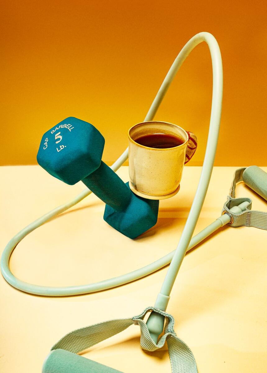 Workout equipment and a cup of coffee in New York, Jan. 26, 2023. (Shawn Michael Jones/The New York Times)