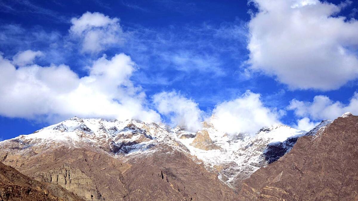 Snow-covered mountains in Kharmang.