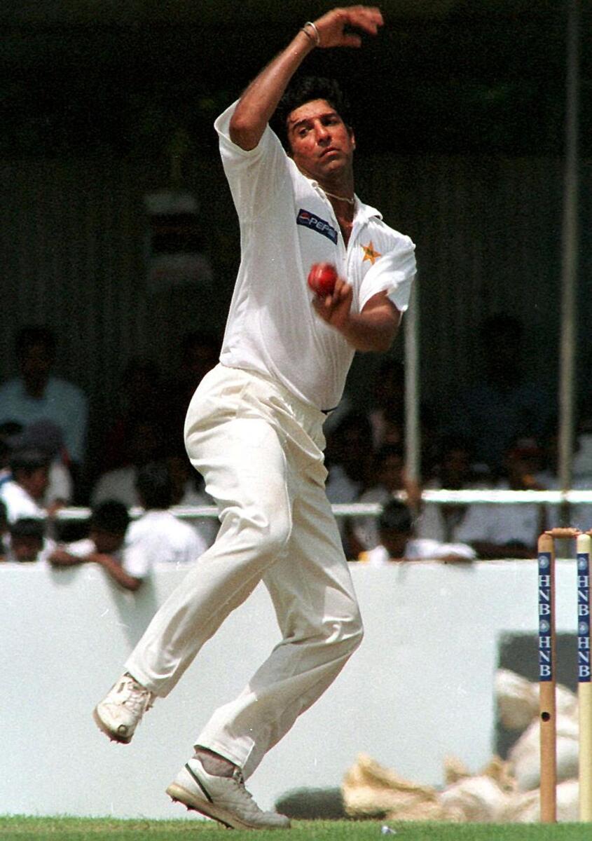 Wasim Akram bowls during a Test match against Sri Lanka at Galle. — AFP file