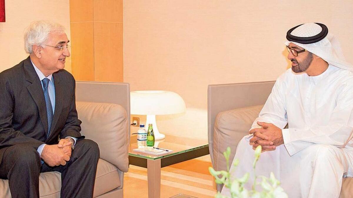 2013-His Highness Shaikh Mohammed bin Zayed Al Nahyan, Crown Prince of Abu Dhabi and Deputy Supreme Commander of the UAE Armed Forces, with then Indian Foreign Minister Salman Khurshid in Abu Dhabi.—Wam