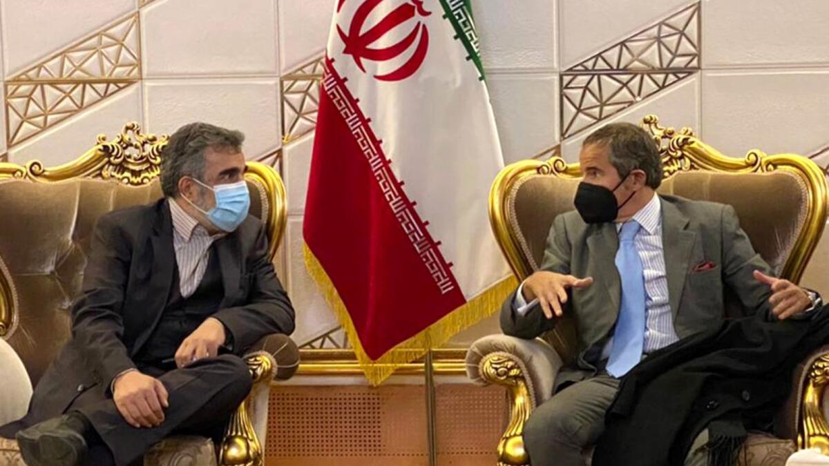 Atomic Energy Organization of Iran spokesman Behrouz Kamalvandi (left) in a meeting with Rafael Grossi, head of the International Atomic Energy Agency (IAEA), upon his arrival in the capital Tehran. – AFP