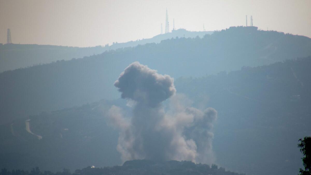 Smoke billows after Israeli bombardment over Lebanon's southern town of Kfar Kila near the border with Israel. — AFP