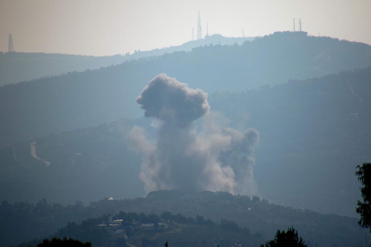 Smoke billows after Israeli bombardment over Lebanon's southern town of Kfar Kila near the border with Israel on December 30, 2023. Photo: AFP