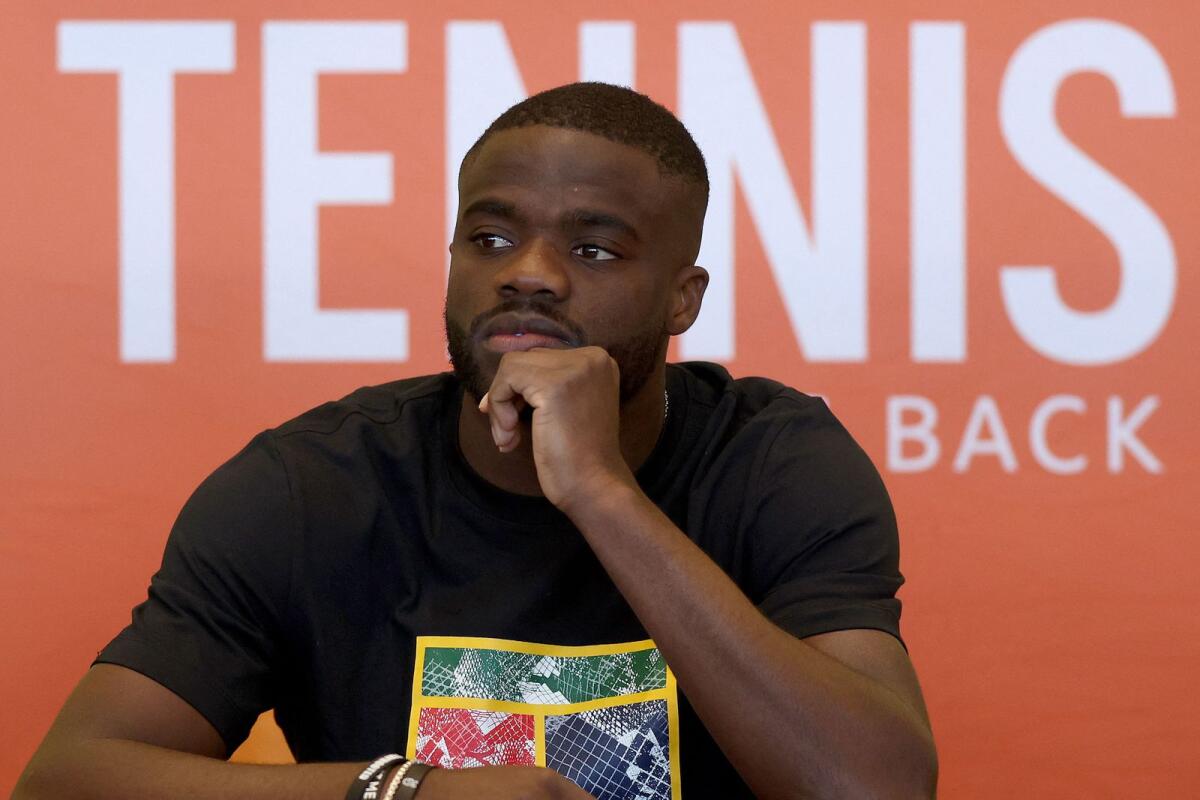 Frances Tiafoe fields at a press conference. — AFP