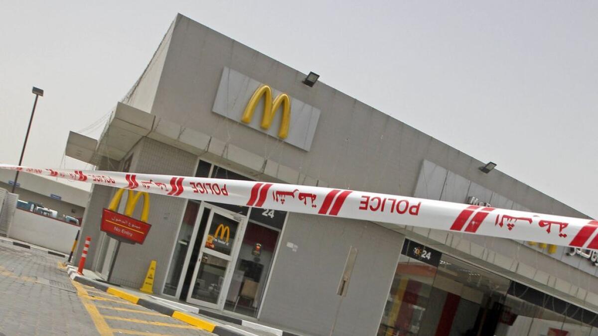 View of the site where 2 people died after a car crashed into McDonald's fast food restaurant at a petrol station in Al Humaidiya area in Ajman.—KT file photo