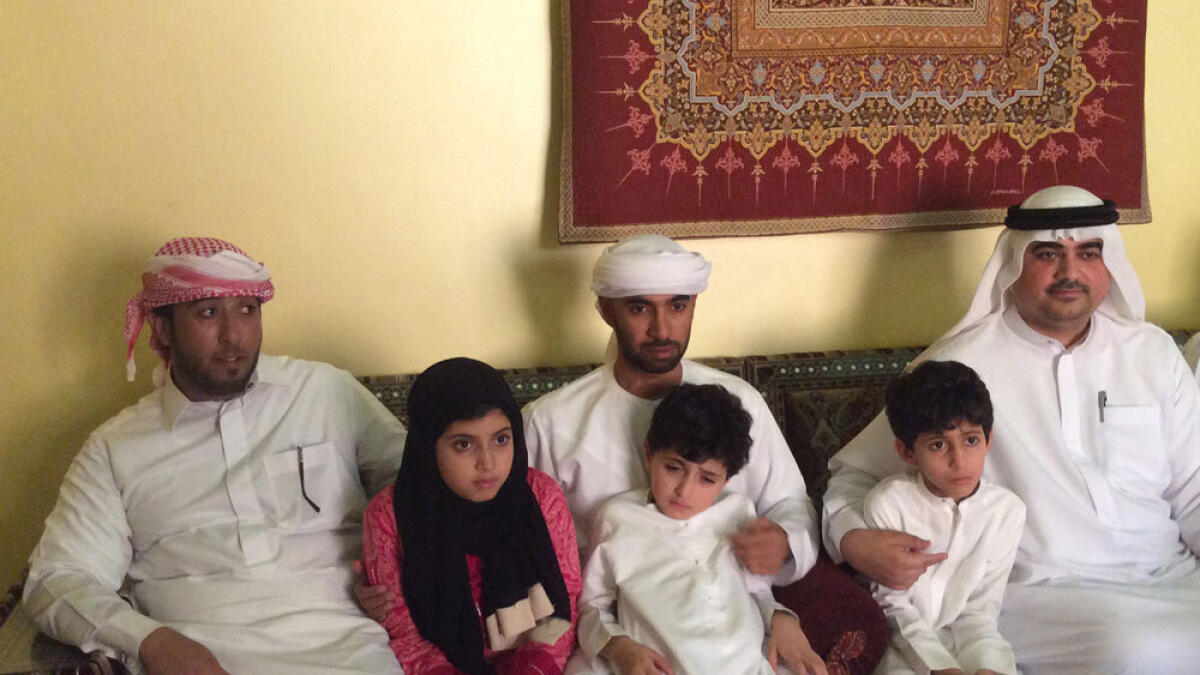 Al Falasi's children with other family members.