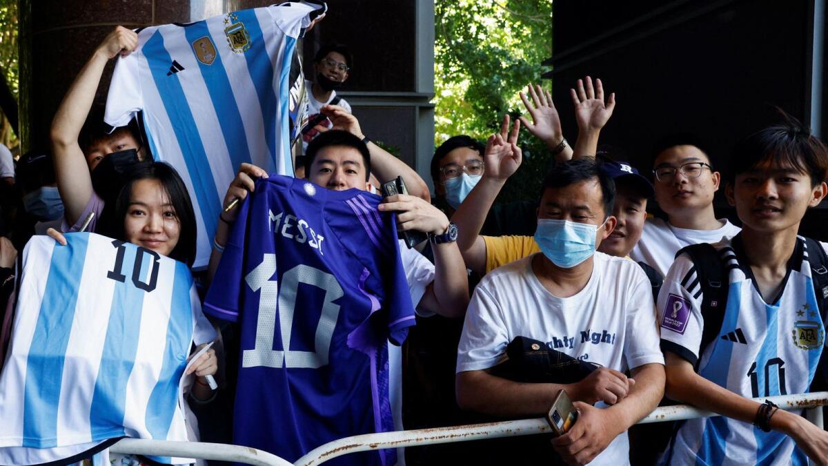 Chinese fans of Argentina’s Lionel Messi wait for his arrival at a hotel ahead of International Friendly match between Argentina's national football team and Australia in Beijing, China. 0 Reuters