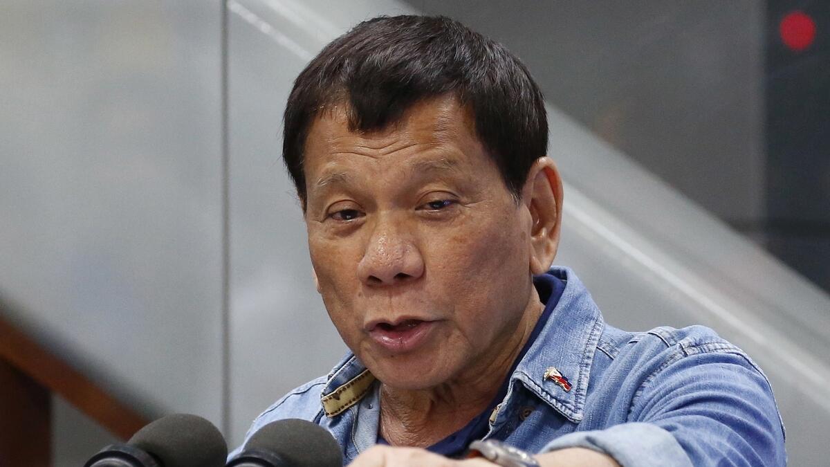 Philippines Duterte tells UN expert to go to hell 