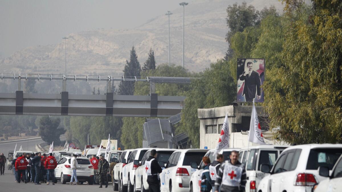 A convoy consisting of Red Cross, Red Crescent and United Nation (UN) gather before heading towards to Madaya from Damascus, and to Al Foua and Kefraya in Idlib province.