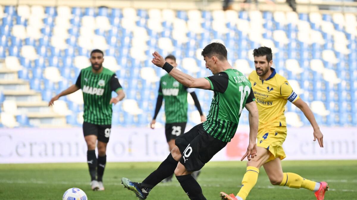 Sassuolo and Verona players are fighting it out. — Reuters