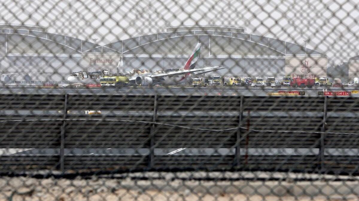 The damaged aircraft is seen at the Dubai airport.