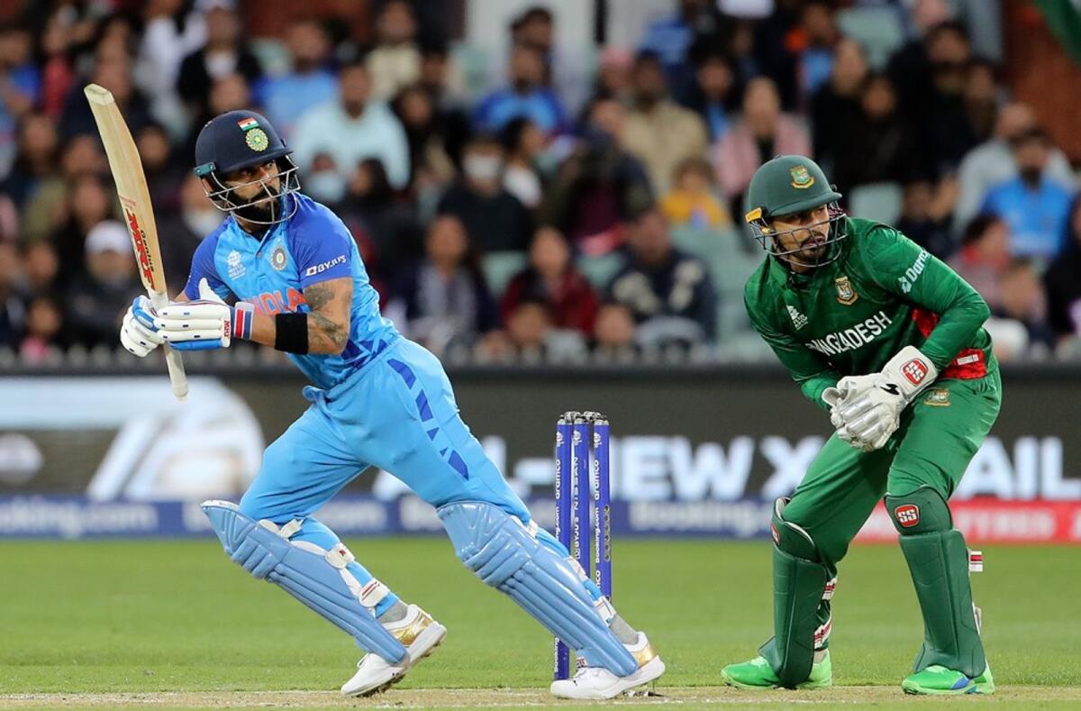 Virat Kohli plays a shot during the match against Bangladesh on Wednesday. -- AFP