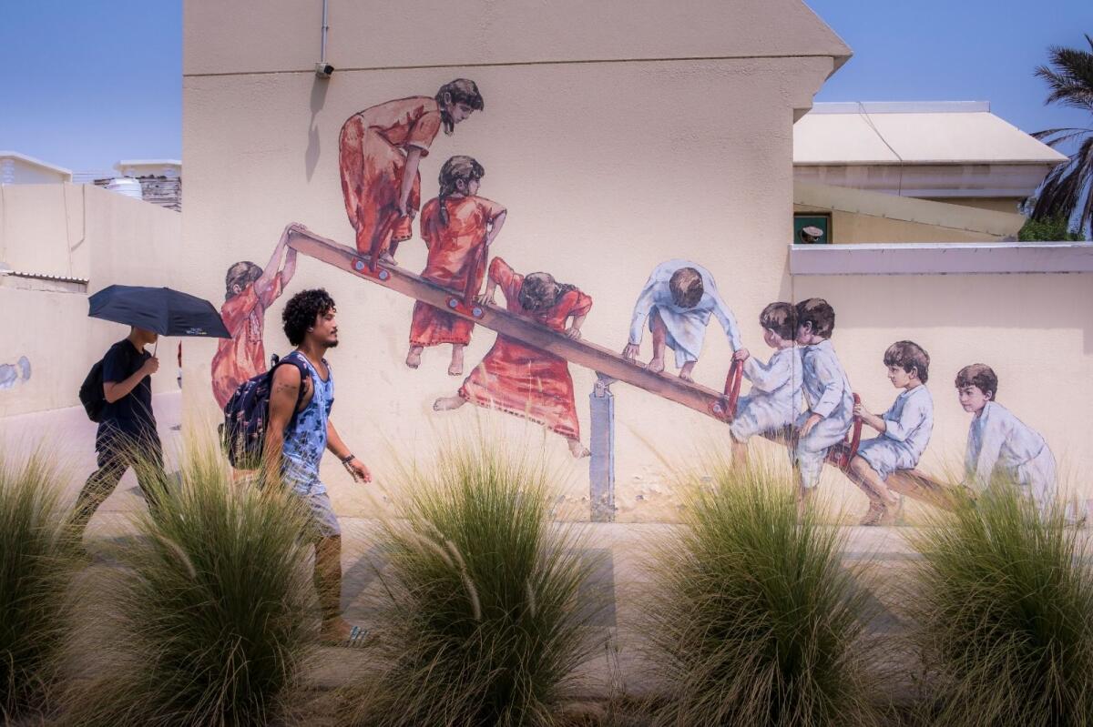 Stunning art pieces adorn the streets of Jumeirah showing Emirati children playing see-saw. Photo: Shihab