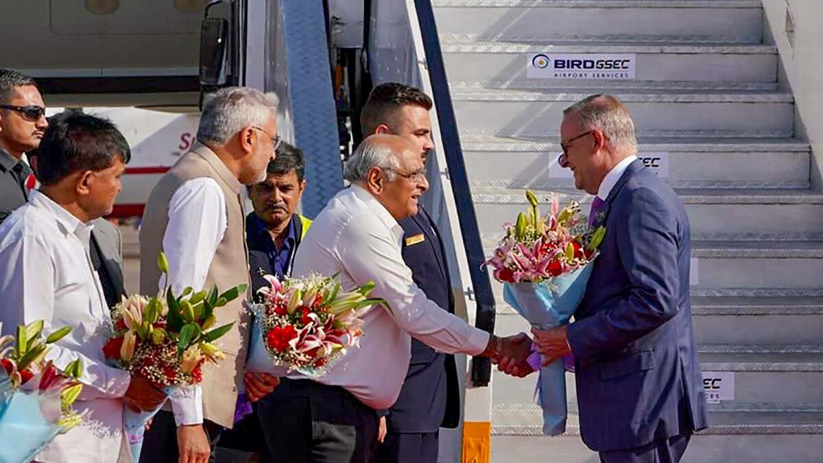 Prime Minister of Australia Anthony Albanese being welcomed by Gujarat CM Bhupendra Patel on his arrival in Ahmedabad on Wednesday. — PTI