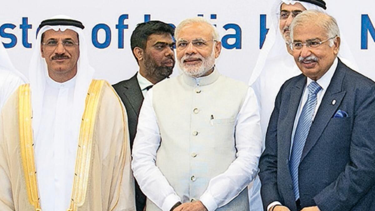 Dr. Ram Buxani with Prime Minister of India Narendra Modi during his first visit to Masdar City, Abu Dhabi, in August 2015. (From left) Sultan bin Saeed Al Mansouri, former UAE Minister of Economy; PM Modi and Dr. Ram Buxani.