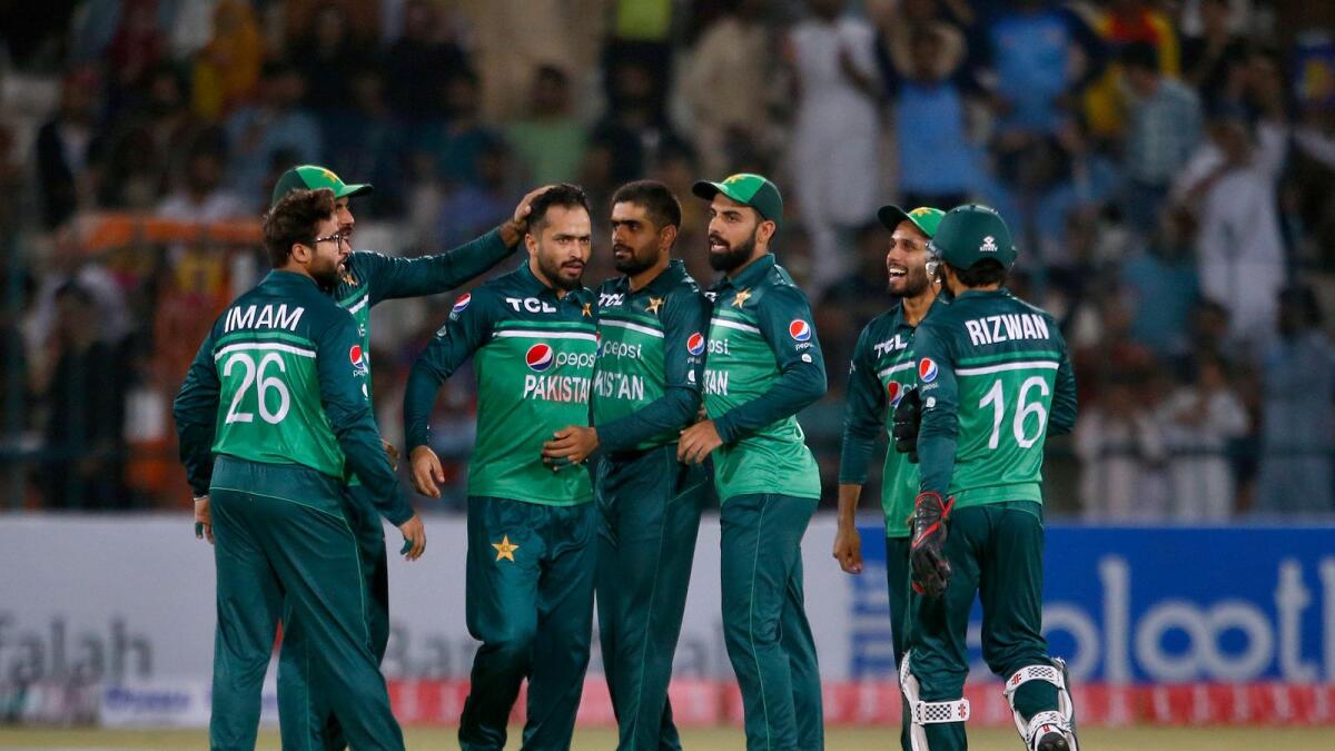Pakistan's Mohammad Nawaz (third from left) celebrates with his teammates. — AP