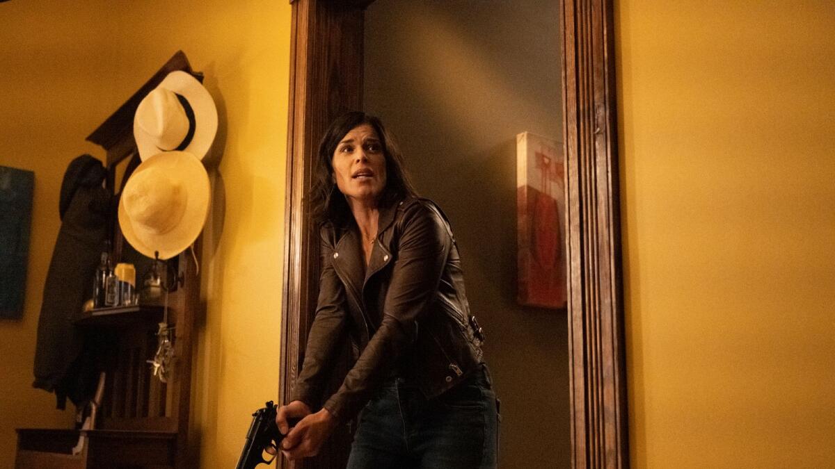 Neve Campbell returns in the new 'Scream'. (Photos: AP)