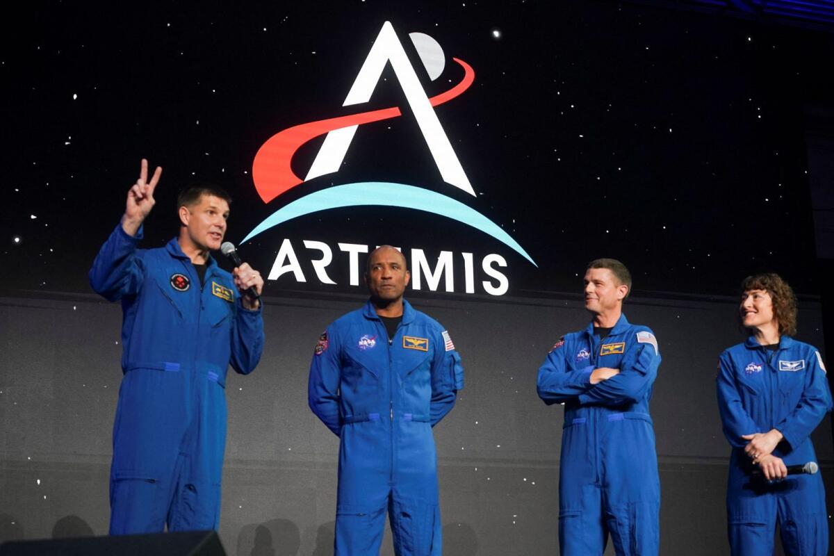 Astronauts Reid Wiseman, Victor Glover, Jeremy Hanson and Christina Koch, crew members of the Artemis II space mission to the moon and back, attend an Nasa event in Houston, Texas, on Monday. — Reuters
