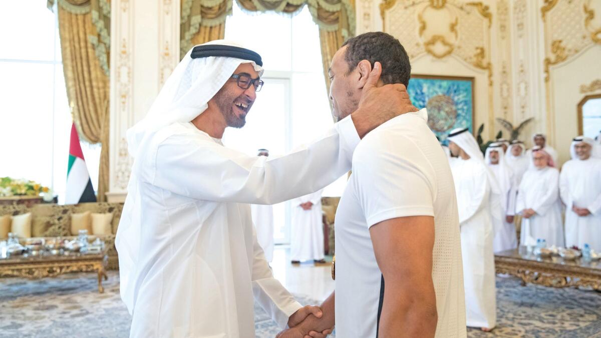 Sheikh Mohamed with UAE's jiu-jitsu champion Faisal Al Ketbi