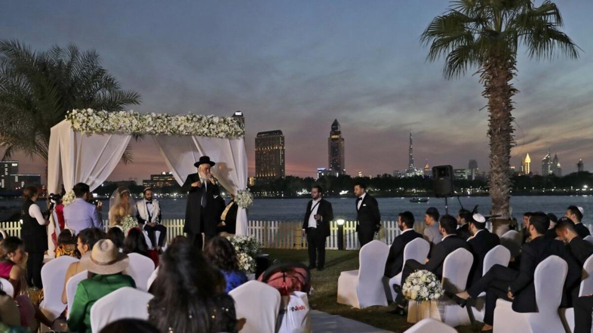A rabbi officiates under a traditional Jewish wedding canopy during marriage ceremony of an Israeli couple at a hotel in Dubai. — AP