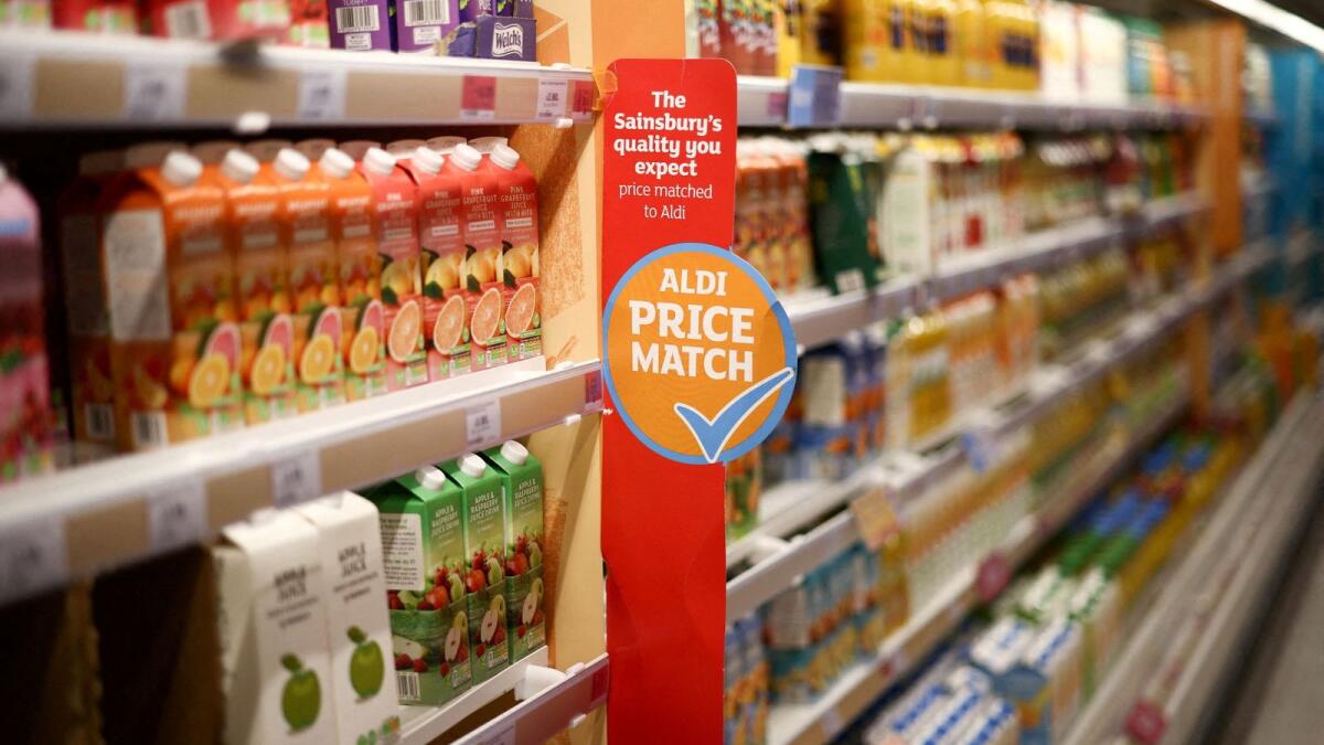 Signage is seen on food shelves inside a Sainsbury's supermarket in Richmond, west London, Britain. Britain is not alone in facing soaring price growth but there are signs it will continue to struggle with rising inflation for longer than other countries. — Reuters file photo