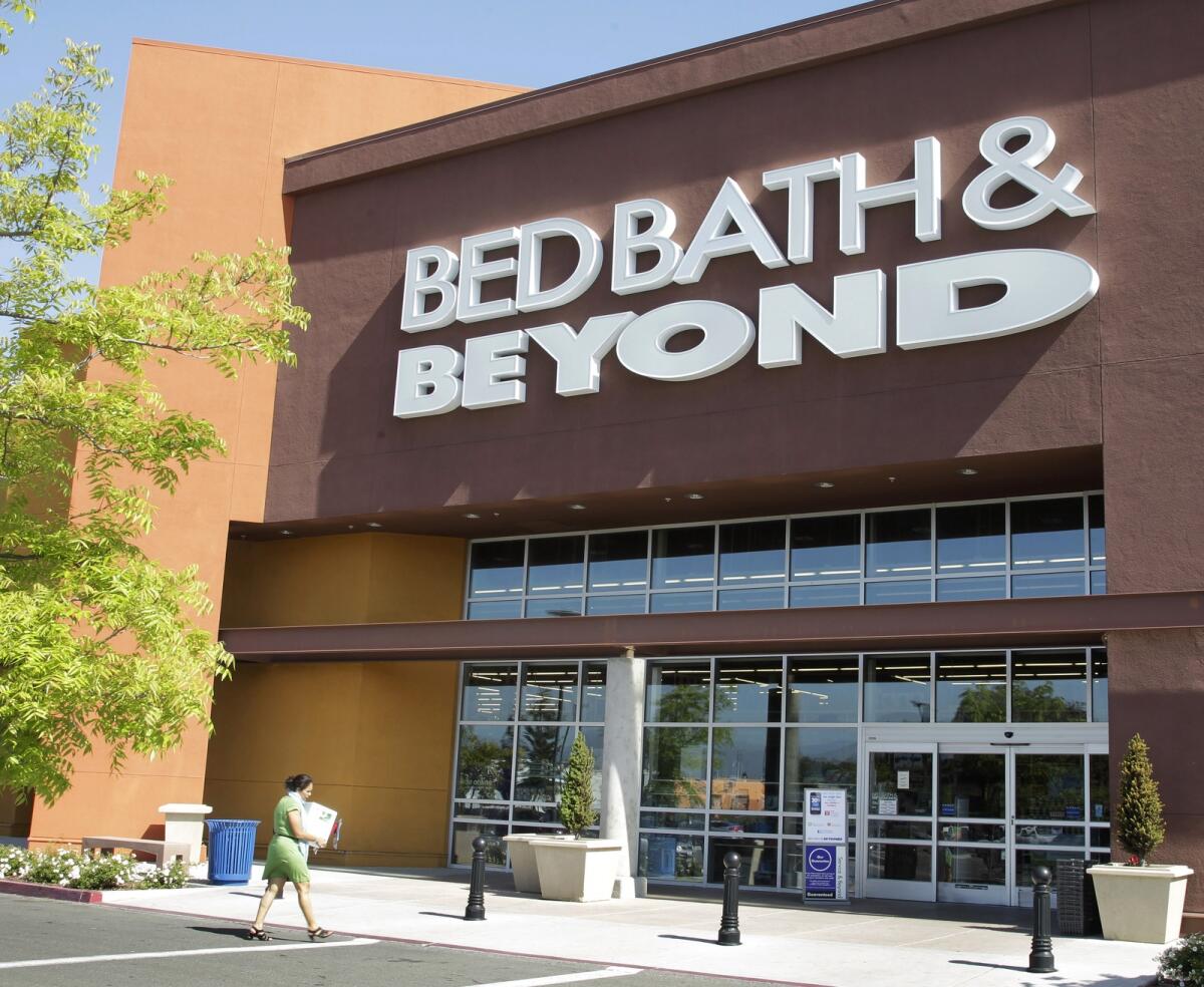 A Bed Bath &amp; Beyond customer enters a store in Mountain View, California, on May 9, 2012. — AP file