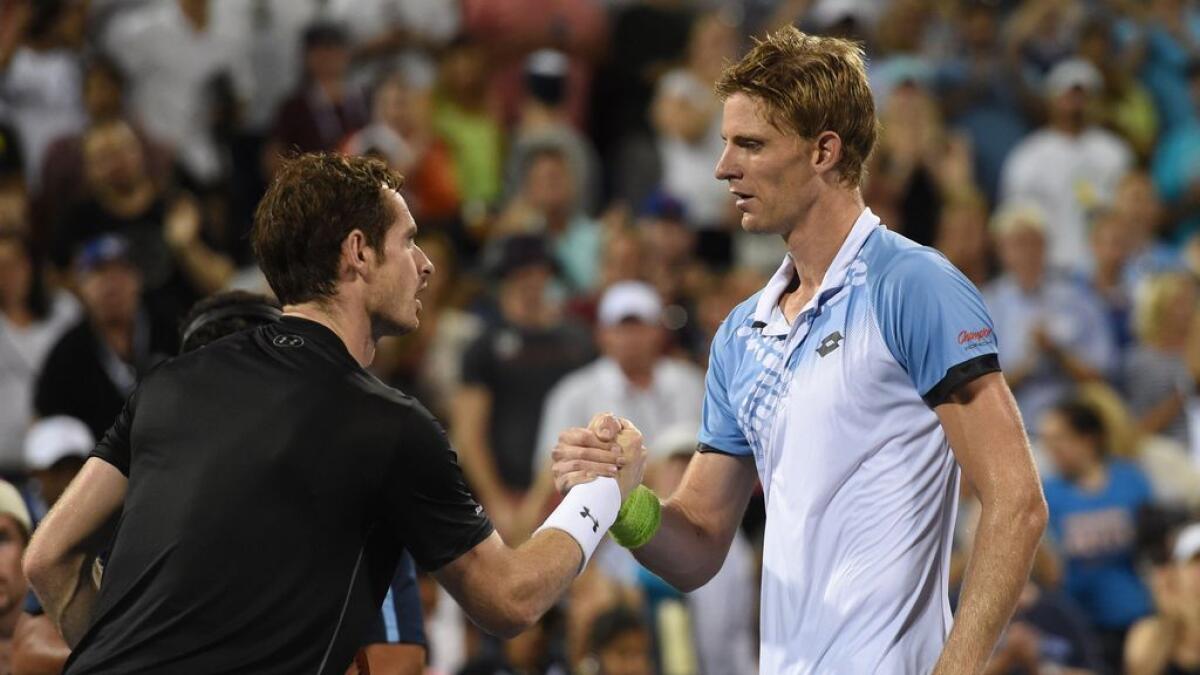 Murray ousted by Anderson, Federer advances at US Open
