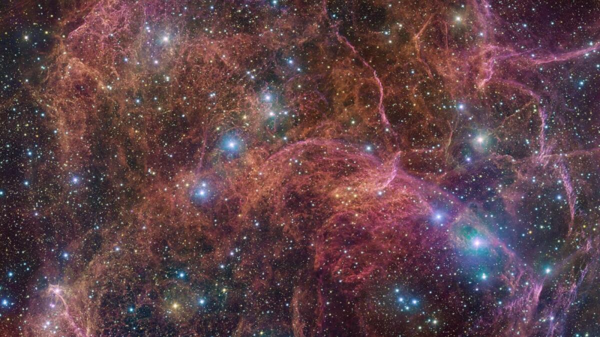 An undated image shows a view of the orange and pink clouds that make up what remains after the explosive death of a massive star — the Vela supernova remnant.  — Reuters