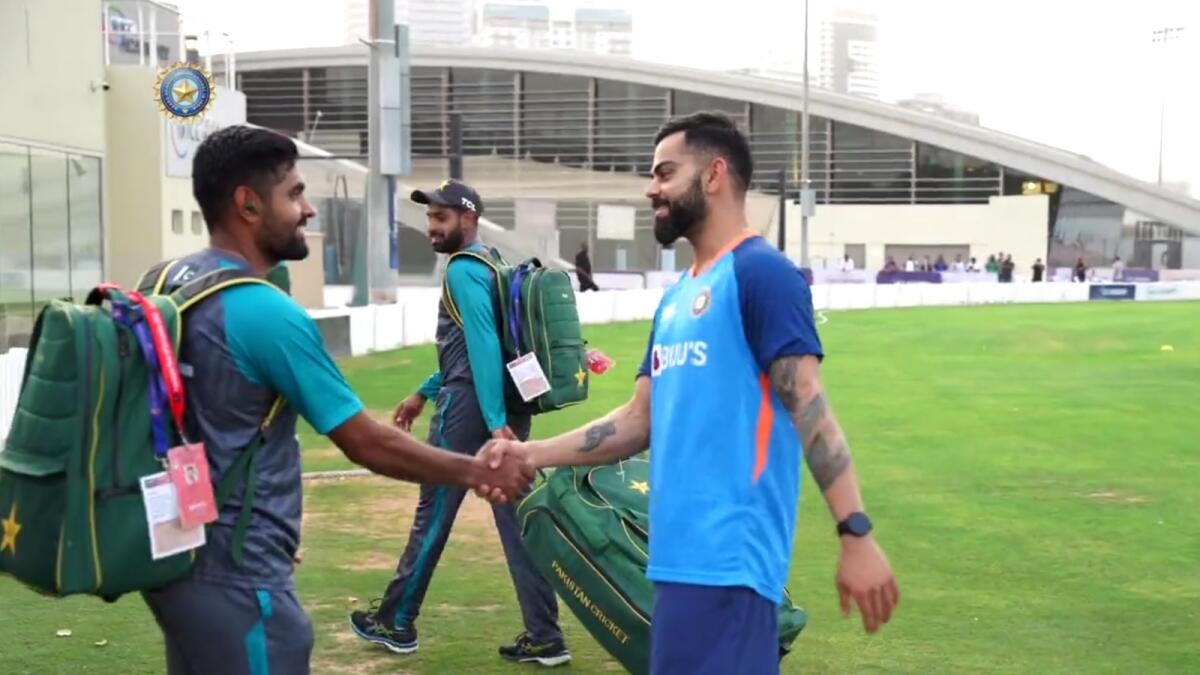 India's Virat Kohli (right) and Pakistan's Babar Azam in Dubai on Wednesday. — BCCI