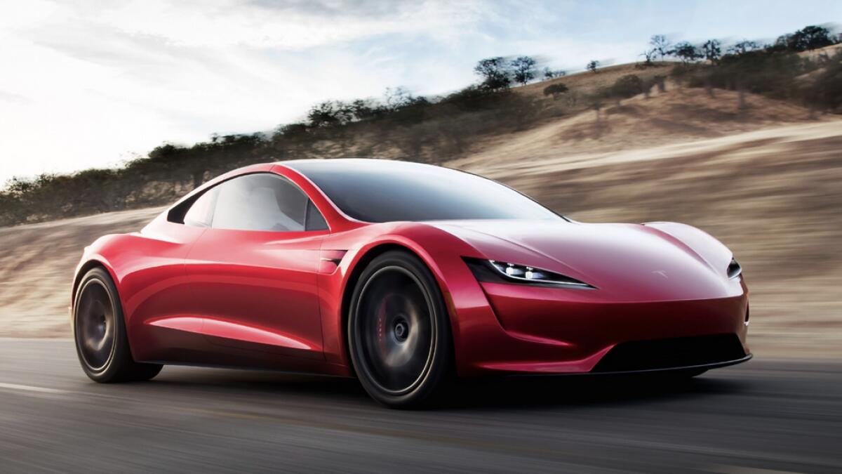 First flight of Falcon Heavy rocket will carry Tesla Roadster