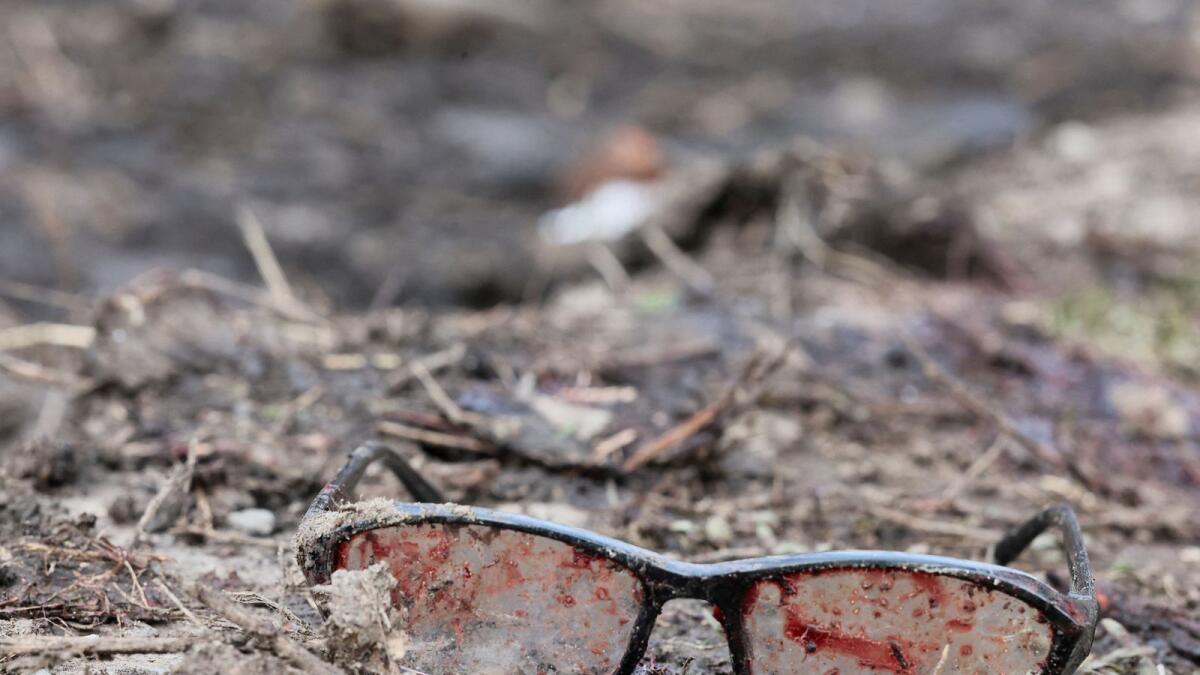 A view shows a pair of glasses with blood on them, in the aftermath of deadly shelling of residential buildings as Russia's attack on Ukraine continues, in Kostiantynivka, Ukraine, on Sunday. -- Reuters