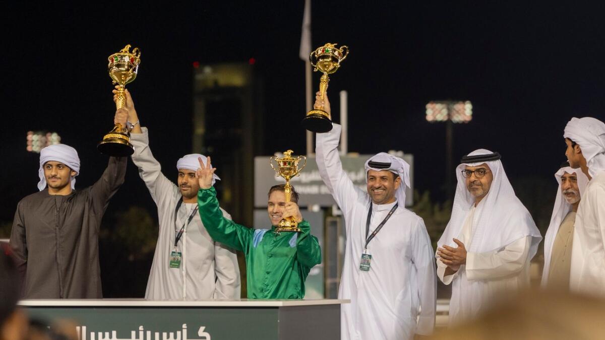 Sheikh Hamed bin Zayed and Sheikh Nahyan bin Mubarak with the winning connections. - Supplied photo
