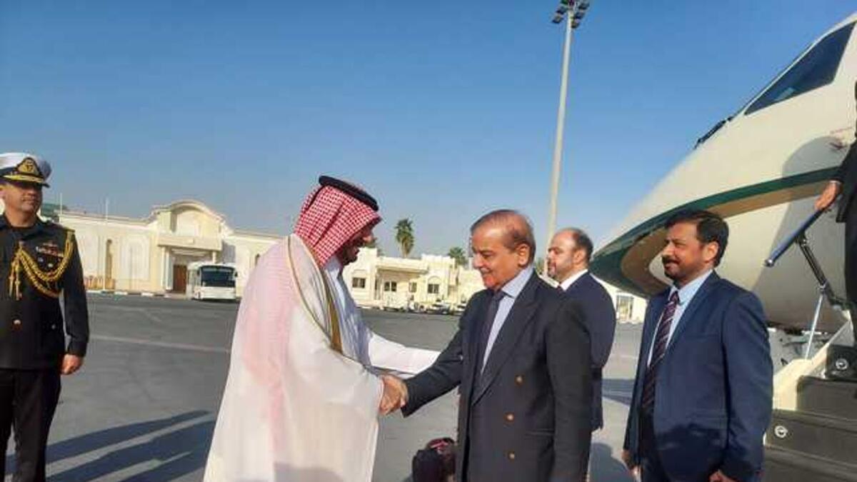 Prime Minister Shehbaz Sharif being greeted by a Qatari official upon his arrival in Doha. — Courtesy Twitter