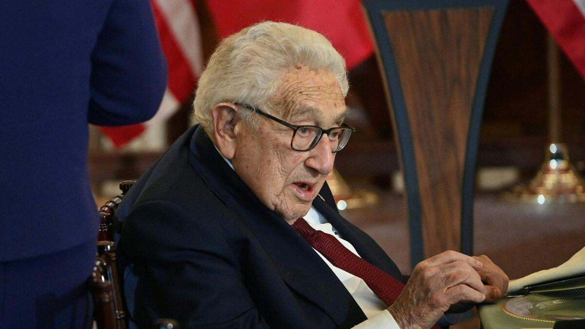 Former US secretary of state Henry Kissinger attends a luncheon at the US State Department in Washington, DC, on December 1, 2022 — AFP