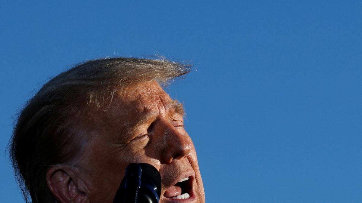 US President Donald Trump speaks during his campaign rally at Green Bay Austin Straubel International Airport in Green Bay, Wisconsin, U.S., October 30, 2020.