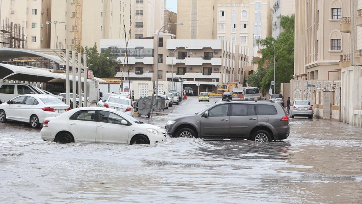 Qatar bans contractors leaving country in rain-damage probe